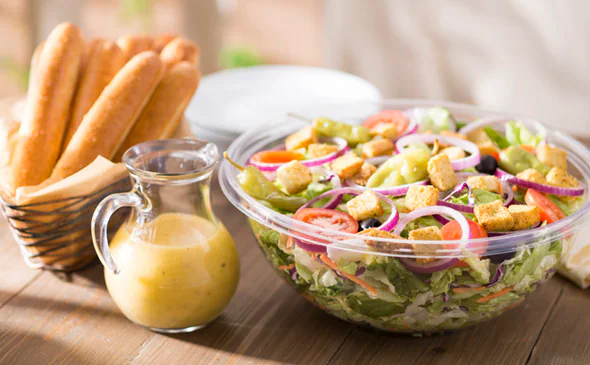 Our Famous Jumbo House Salad includes 12 Breadsticks